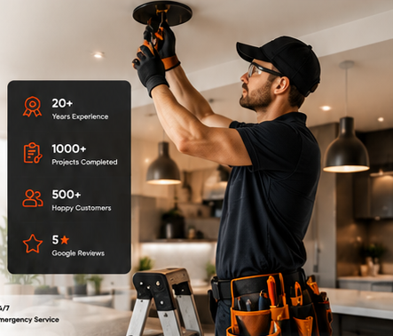 Electrician installing ceiling lighting
